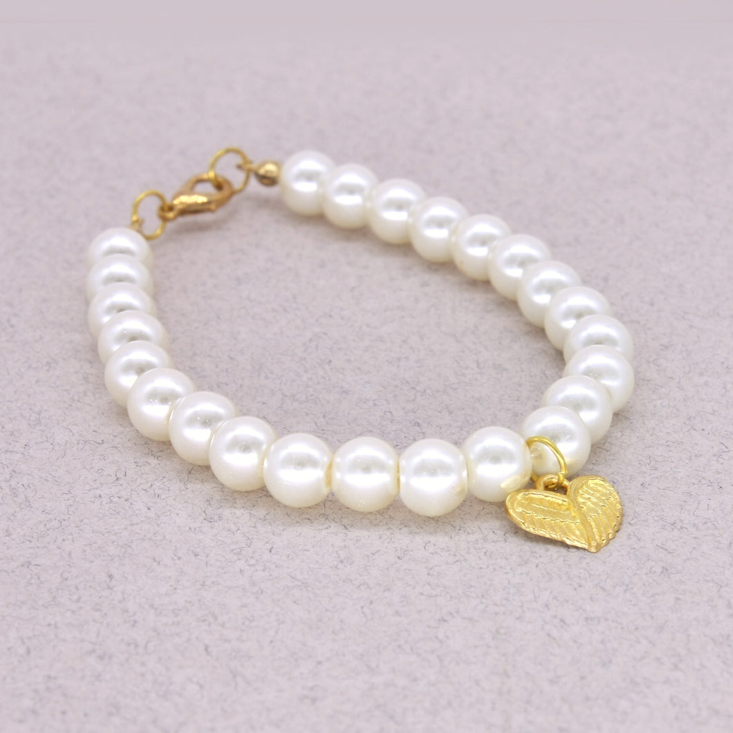 gold heart with chain of pearls necklace