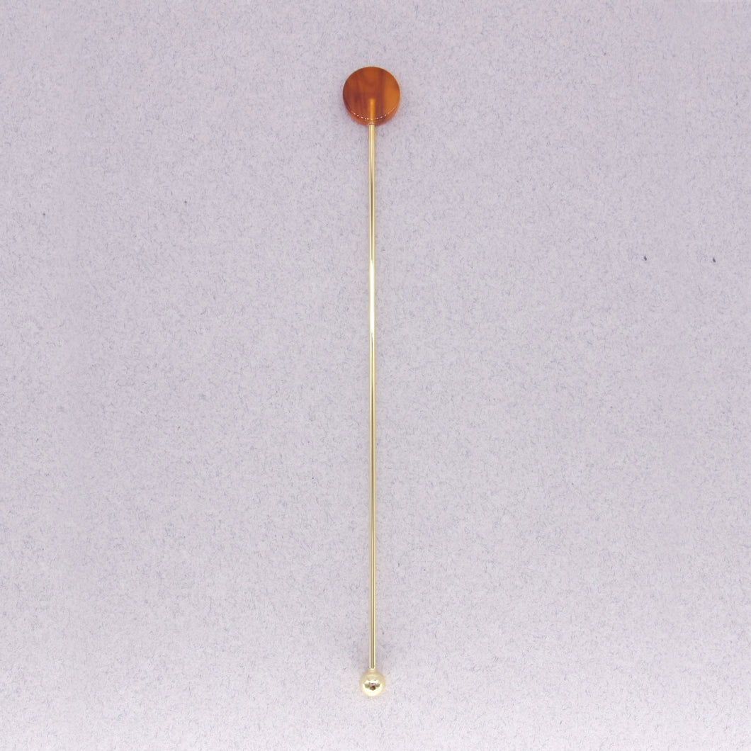 Amber circle swizzle stick